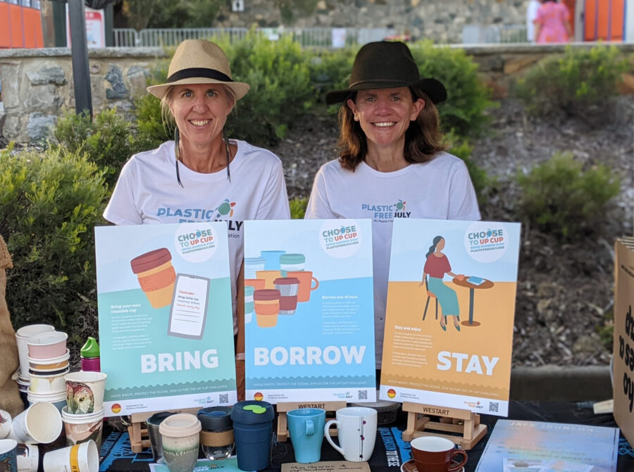 Izzi and Rebecca at the Jack Johnson Plastic Free July stand.