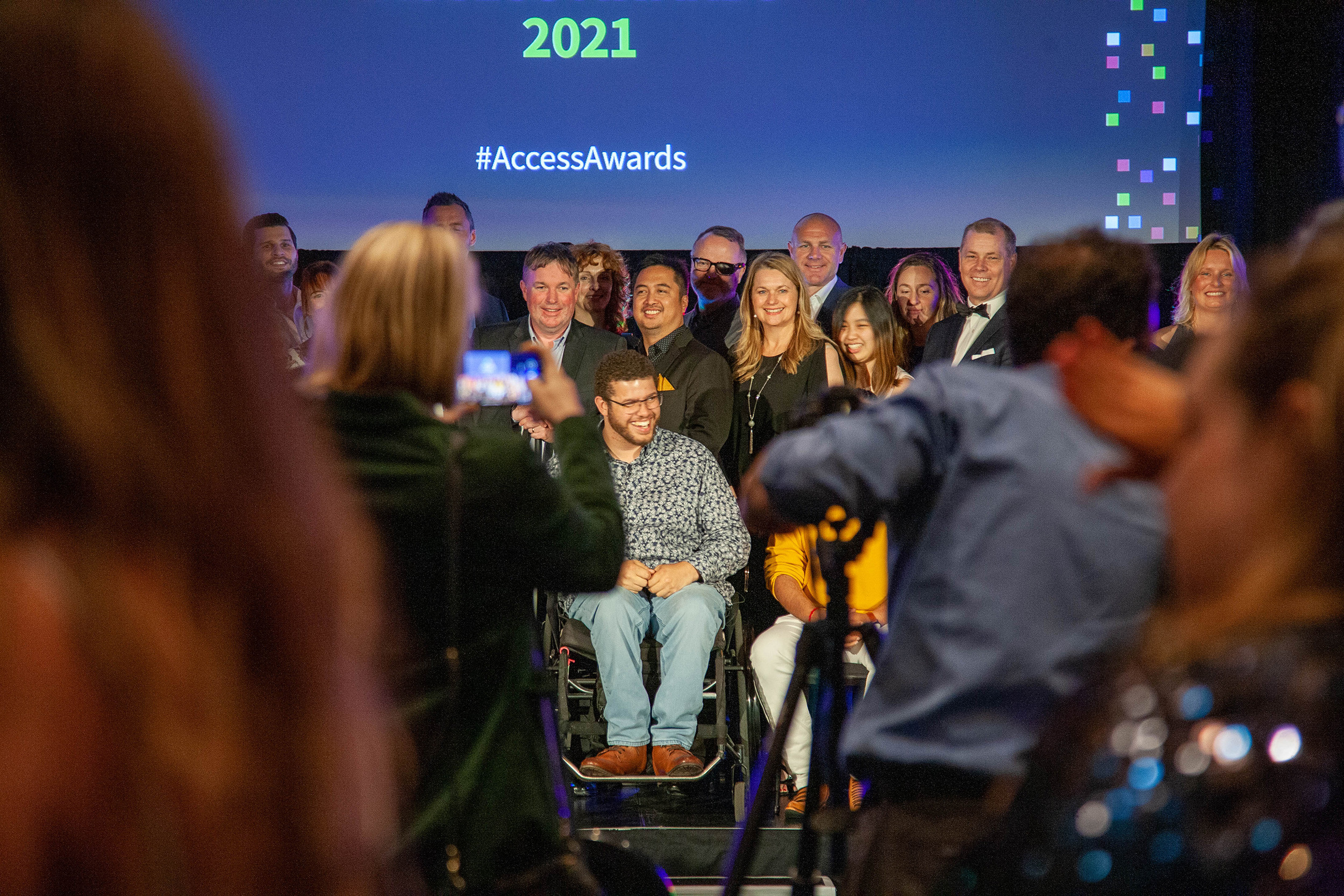 People on stage smiling at the 2021 CFA Access Awards